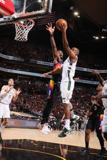 Khris Middleton of the Milwaukee Bucks shoots the ball against the Phoenix Suns during Game One of the 2021 NBA Finals on July 6, 2021 at Talking...