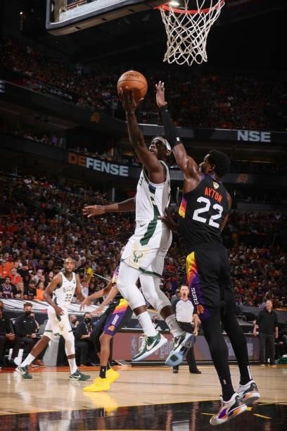 Jrue Holiday of the Milwaukee Bucks drives to the basket against the Phoenix Suns during Game One of the 2021 NBA Finals on July 6, 2021 at Talking...