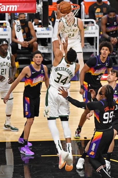 Giannis Antetokounmpo of the Milwaukee Bucks dunks the ball against the Phoenix Suns during Game One of the 2021 NBA Finals on July 6, 2021 at...