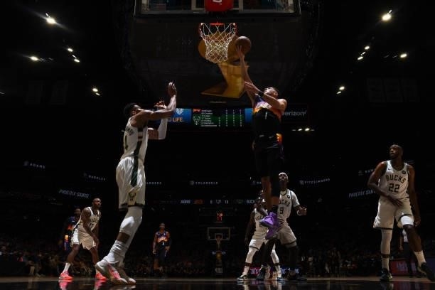 Devin Booker of the Phoenix Suns drives to the basket drives to the basket against the Milwaukee Bucks during Game One of the 2021 NBA Finals on July...