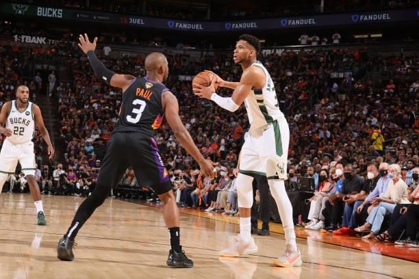 Chris Paul of the Phoenix Suns plays defense on Giannis Antetokounmpo of the Milwaukee Bucks during Game One of the 2021 NBA Finals on July 6, 2021...