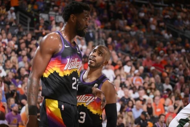 Chris Paul of the Phoenix Suns talks with Deandre Ayton of the Phoenix Suns during Game One of the 2021 NBA Finals on July 6, 2021 at Talking Stick...