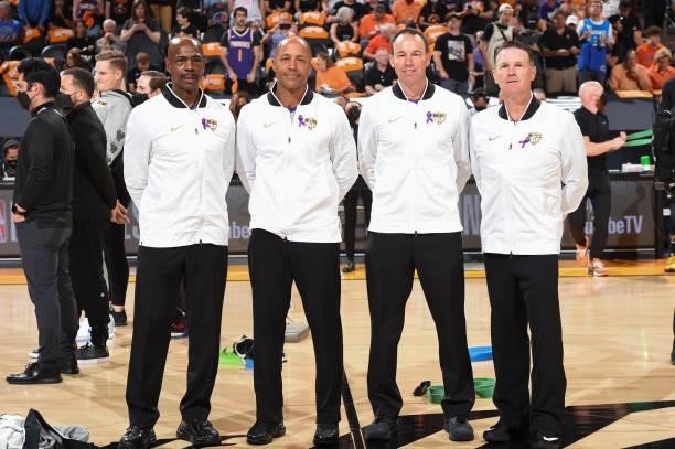 Referee Tom Washington, referee Marc Davis, referee Josh Tiven and referee Pat Fraher pose for a photo before the game between the Milwaukee Bucks...