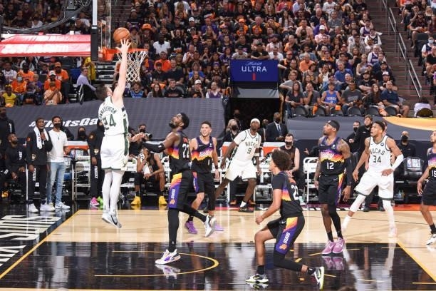 Pat Connaughton of the Milwaukee Bucks drives to the basket during the game against the Phoenix Suns during Game One of the 2021 NBA Finals on July...