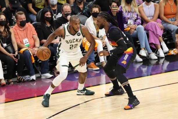 Jae Crowder of the Phoenix Suns plays defense on Khris Middleton of the Milwaukee Bucks during Game One of the 2021 NBA Finals on July 6, 2021 at...