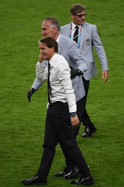 Roberto Mancini, coach of Italy celebrates the win at penalty shoot out with Spain during the UEFA Euro 2020 Championship Semi-final match between...