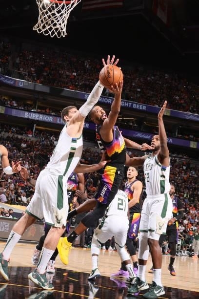Mikal Bridges of the Phoenix Suns shoots the ball against the Milwaukee Bucks during Game One of the 2021 NBA Finals on July 6, 2021 at Talking Stick...