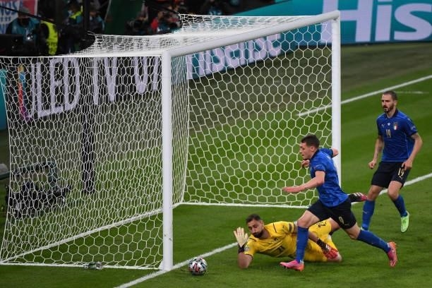Gianluigi Donnarumma of Italy saves during the UEFA Euro 2020 Championship Semi-final match between Italy and Spain at Wembley Stadium on July 6,...