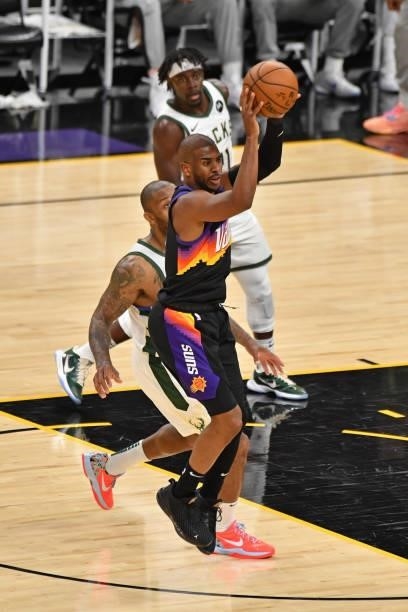 Chris Paul of the Phoenix Suns passes the ball against the Milwaukee Bucks during Game One of the 2021 NBA Finals on July 6, 2021 at Phoenix Suns...