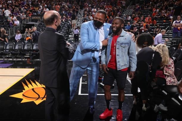Announcers, Mark Jackson, and Jeff Van Gundy pose with boxer, Floyd Mayweather during Game One of the 2021 NBA Finals on July 6, 2021 at Talking...