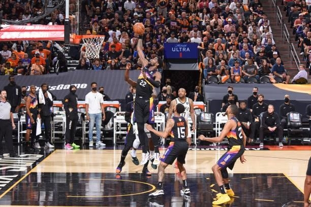 Deandre Ayton of the Phoenix Suns rebounds the ball during the game against the Milwaukee Bucks during Game One of the 2021 NBA Finals on July 6,...