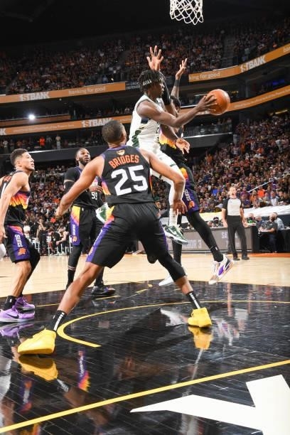 Jrue Holiday of the Milwaukee Bucks passes the ball during the game against the Phoenix Suns during Game One of the 2021 NBA Finals on July 6, 2021...