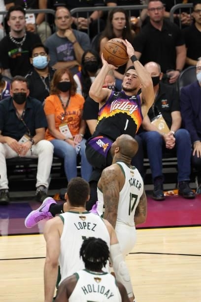 Devin Booker of the Phoenix Suns shoots the ball against the Milwaukee Bucks during Game One of the 2021 NBA Finals on July 6, 2021 at Phoenix Suns...