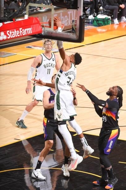 Giannis Antetokounmpo of the Milwaukee Bucks dunks the ball during the game against the Phoenix Suns during Game One of the 2021 NBA Finals on July...