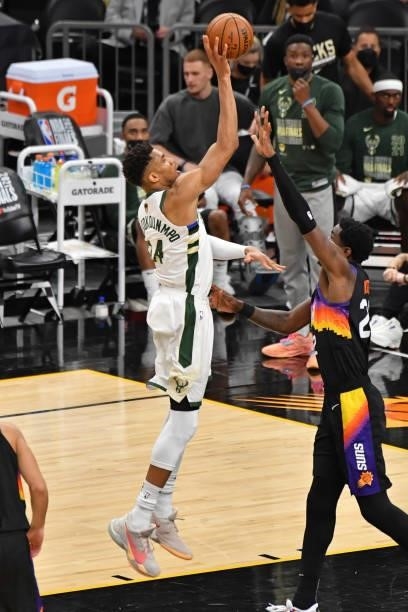 Giannis Antetokounmpo of the Milwaukee Bucks shoots the ball against the Phoenix Suns during Game One of the 2021 NBA Finals on July 6, 2021 at...