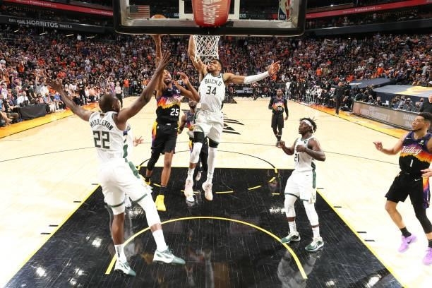 Giannis Antetokounmpo of the Milwaukee Bucks blocks the shot of Mikal Bridges of the Phoenix Suns during Game One of the 2021 NBA Finals on July 6,...