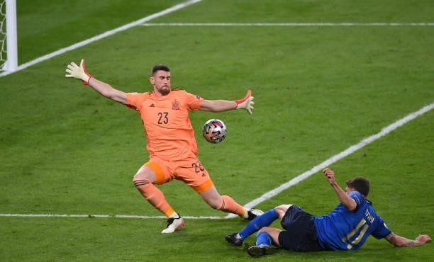 Domenico Berardi of Italy beats Unai Simon of Spain, but ruled out for offside during the UEFA Euro 2020 Championship Semi-final match between Italy...