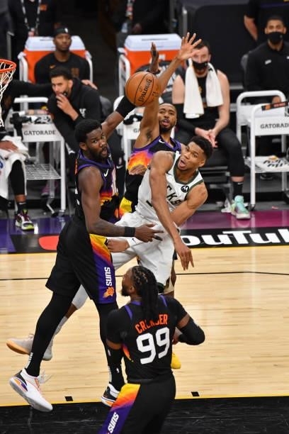 Giannis Antetokounmpo of the Milwaukee Bucks passes the ball against the Phoenix Suns during Game One of the 2021 NBA Finals on July 6, 2021 at...