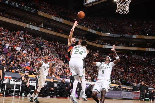 Devin Booker of the Phoenix Suns shoots the ball against the Milwaukee Bucks during Game One of the 2021 NBA Finals on July 6, 2021 at Talking Stick...