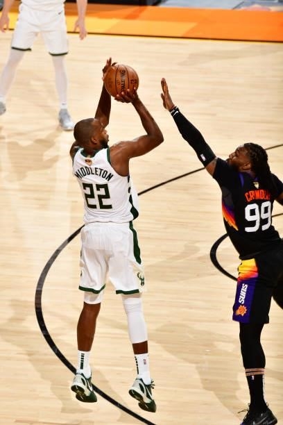 Khris Middleton of the Milwaukee Bucks shoots a three point basket against the Phoenix Suns during Game One of the 2021 NBA Finals on July 6, 2021 at...