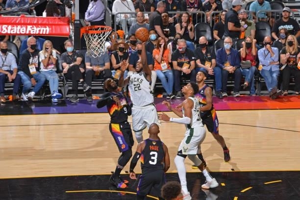 Khris Middleton of the Milwaukee Bucks drives to the basket against the Phoenix Suns during Game One of the 2021 NBA Finals on July 6, 2021 at...