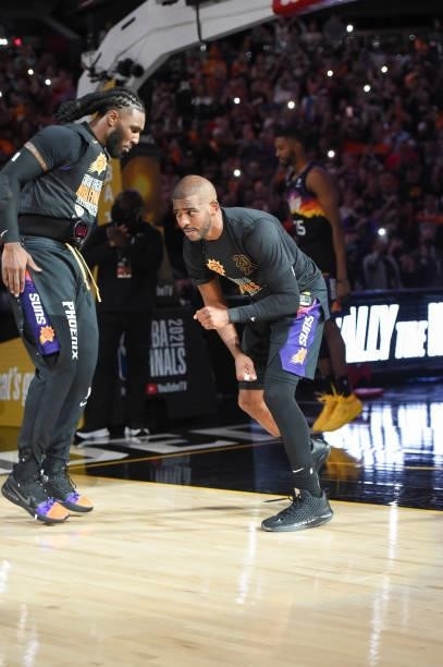 Chris Paul of the Phoenix Suns greets Jae Crowder of the Phoenix Suns before the game against the Milwaukee Bucks during Game One of the 2021 NBA...