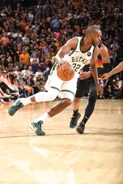 Khris Middleton of the Milwaukee Bucks handles the ball during the game against the Phoenix Suns during Game One of the 2021 NBA Finals on July 6,...