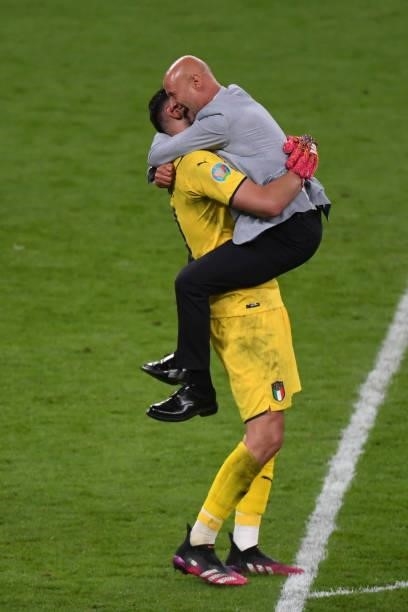 Vialli, former international player of Italy, hugs Gianlugi Donnarumma of Italy to celebrates the win over Spain at penalty shoot out during the UEFA...