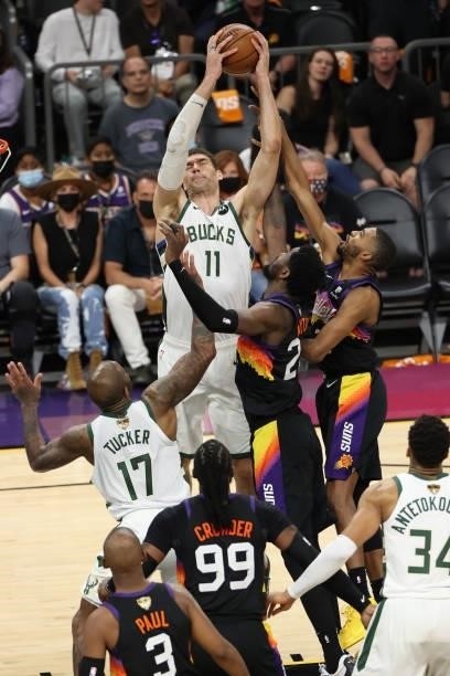 Brook Lopez of the Milwaukee Bucks rebounds the ball during Game One of the 2021 NBA Finals on July 6, 2021 at Phoenix Suns Arena in Phoenix,...