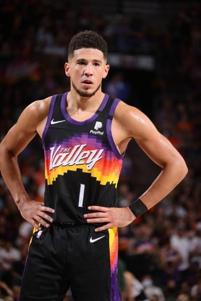 Devin Booker of the Phoenix Suns looks on during Game One of the 2021 NBA Finals on July 6, 2021 at Talking Stick Resort Arena in Phoenix, Arizona....