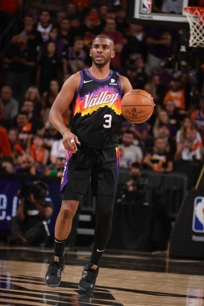 Chris Paul of the Phoenix Suns dribbles the ball against the Milwaukee Bucks during Game One of the 2021 NBA Finals on July 6, 2021 at Talking Stick...