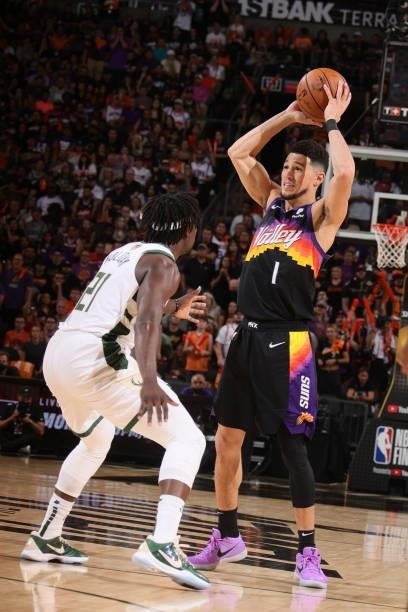 Devin Booker of the Phoenix Suns handles the ball against the Milwaukee Bucks during Game One of the 2021 NBA Finals on July 6, 2021 at Talking Stick...