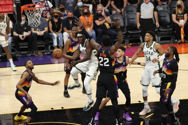 Jrue Holiday of the Milwaukee Bucks passes the ball during Game One of the 2021 NBA Finals on July 6, 2021 at Phoenix Suns Arena in Phoenix, Arizona....