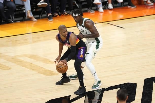 Jrue Holiday of the Milwaukee Bucks plays defense on Chris Paul of the Phoenix Suns during Game One of the 2021 NBA Finals on July 6, 2021 at Phoenix...