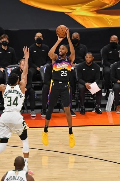 Mikal Bridges of the Phoenix Suns shoots a three point basket against the Milwaukee Bucks during Game One of the 2021 NBA Finals on July 6, 2021 at...
