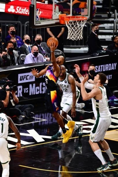 Mikal Bridges of the Phoenix Suns drives to the basket against the Milwaukee Bucks during Game One of the 2021 NBA Finals on July 6, 2021 at Phoenix...