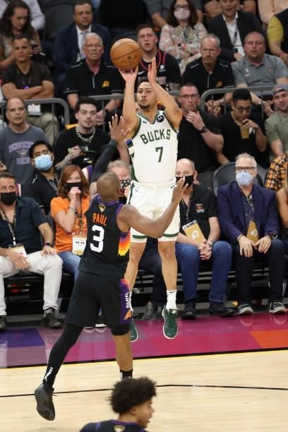 Bryn Forbes of the Milwaukee Bucks shoots a three point basket against the Phoenix Suns during Game One of the 2021 NBA Finals on July 6, 2021 at...