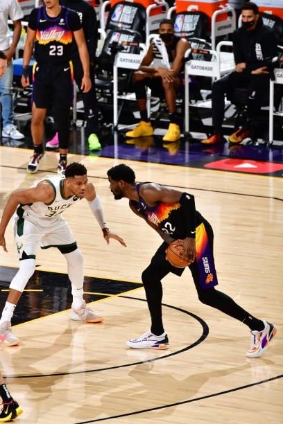 Giannis Antetokounmpo of the Milwaukee Bucks plays defense on Deandre Ayton of the Phoenix Suns during Game One of the 2021 NBA Finals on July 6,...