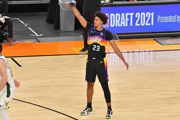 Cameron Johnson of the Phoenix Suns celebrates a three point basket against the Milwaukee Bucks during Game One of the 2021 NBA Finals on July 6,...