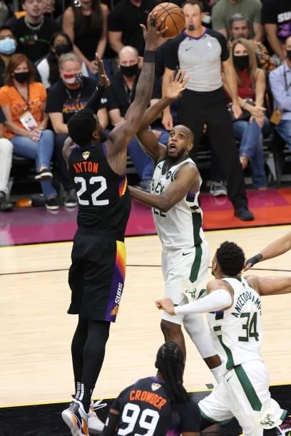 Deandre Ayton of the Phoenix Suns blocks the ball against the Milwaukee Bucks during Game One of the 2021 NBA Finals on July 6, 2021 at Phoenix Suns...