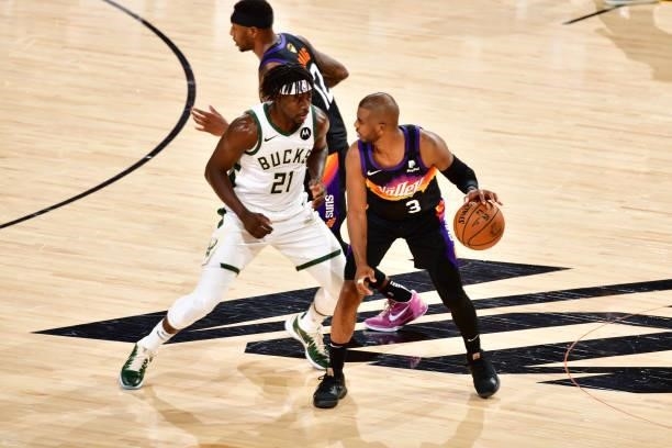 Jrue Holiday of the Milwaukee Bucks plays defense on Chris Paul of the Phoenix Suns during Game One of the 2021 NBA Finals on July 6, 2021 at Phoenix...