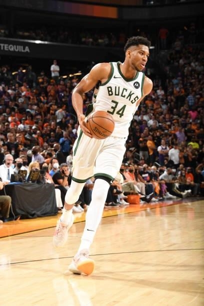 Giannis Antetokounmpo of the Milwaukee Bucks handles the ball during the game against the Phoenix Suns during Game One of the 2021 NBA Finals on July...