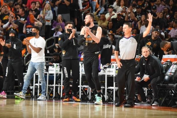 Frank Kaminsky of the Phoenix Suns claps during the game against the Milwaukee Bucks during Game One of the 2021 NBA Finals on July 6, 2021 at...