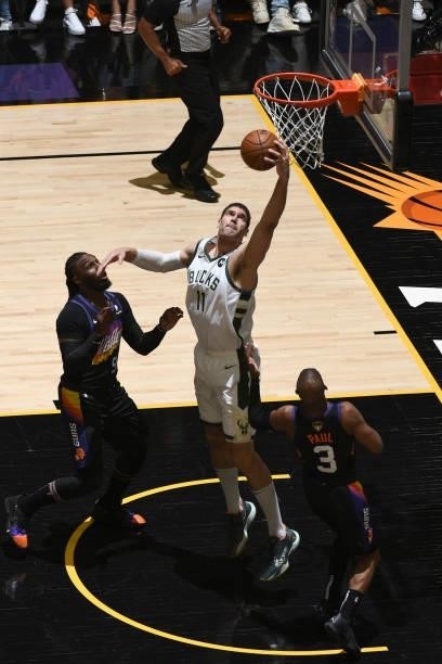 Brook Lopez of the Milwaukee Bucks rebounds teh ball during the game against the Phoenix Suns during Game One of the 2021 NBA Finals on July 6, 2021...
