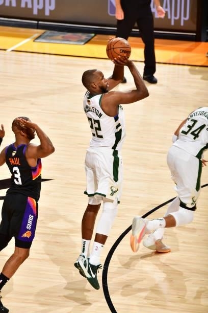 Khris Middleton of the Milwaukee Bucks shoots a three point basket against the Phoenix Suns during Game One of the 2021 NBA Finals on July 6, 2021 at...