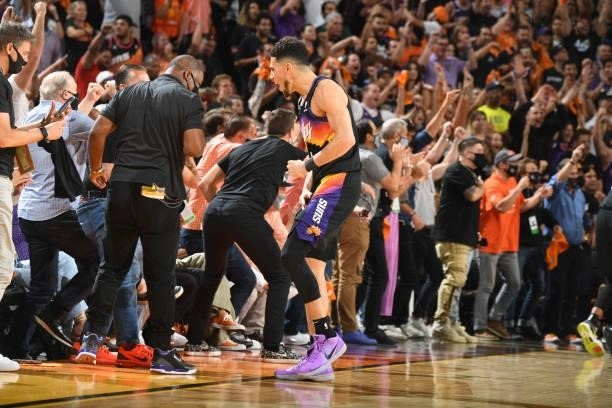 Devin Booker of the Phoenix Suns yells during the game against the Milwaukee Bucks during Game One of the 2021 NBA Finals on July 6, 2021 at Phoenix...
