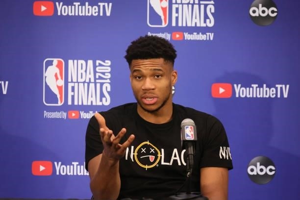 Giannis Antetokounmpo of the Milwaukee Bucks talks to the media after the game against the Phoenix Suns during Game One of the 2021 NBA Finals on...
