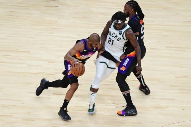 Chris Paul of the Phoenix Suns dribbles the ball against the Milwaukee Bucks during Game One of the 2021 NBA Finals on July 6, 2021 at Phoenix Suns...