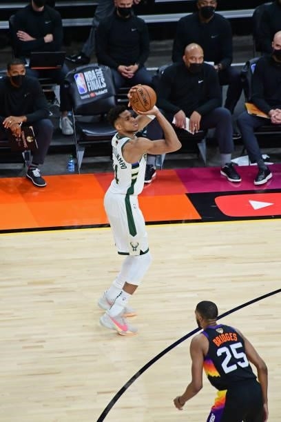 Giannis Antetokounmpo of the Milwaukee Bucks shoots a three point basket against the Phoenix Suns during Game One of the 2021 NBA Finals on July 6,...