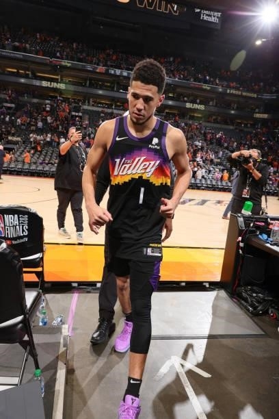 Devin Booker of the Phoenix Suns walks off the court after the game against the Milwaukee Bucks during Game One of the 2021 NBA Finals on July 6,...